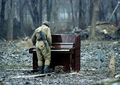 01 . Russian-soldier-playing-an-abandoned-piano-cecenia