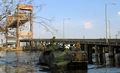 US_Navy_050910-M-5901F-002_U.S._Marines_aboard_an_amphibious_assault_vehicle_(AAV)_search_the_areas_around_the_Chalmette_Bridge_